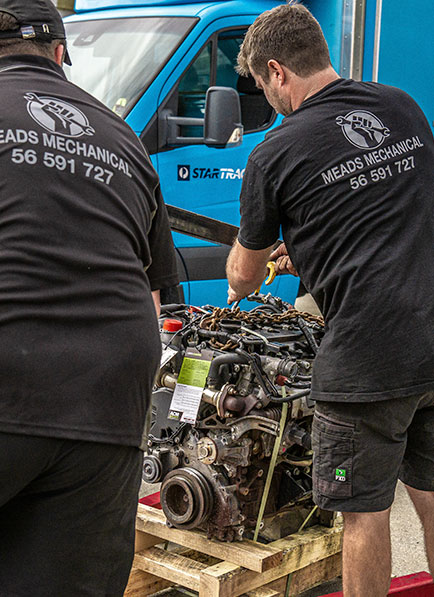 Meads Mechanics working on engine